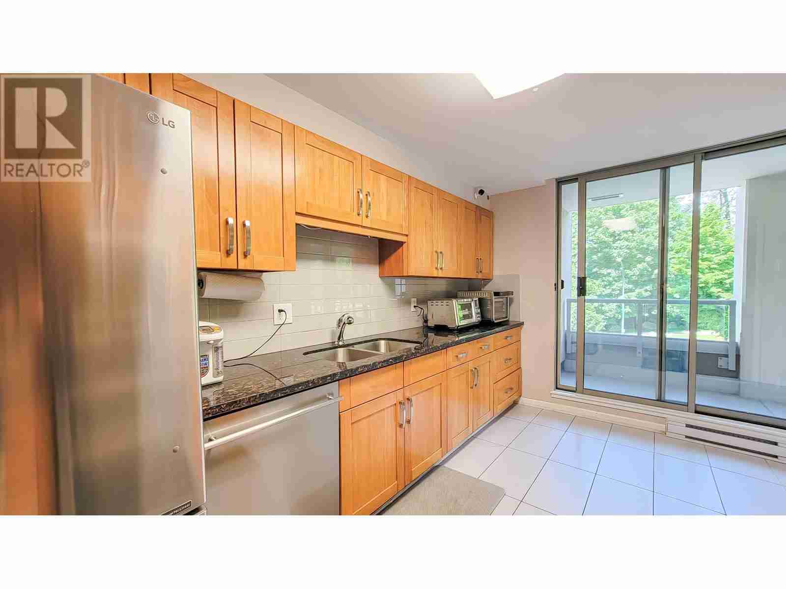 203 3070 GUILDFORD WAY